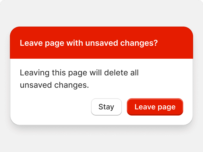 A modal with a bright red header and bright red button that stops the user from navigating away from a page with unsaved changes